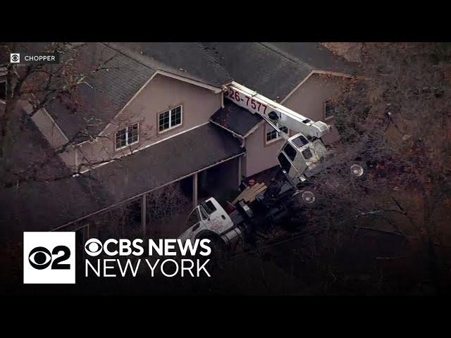 Crane crashes onto home in Morris County, New Jersey