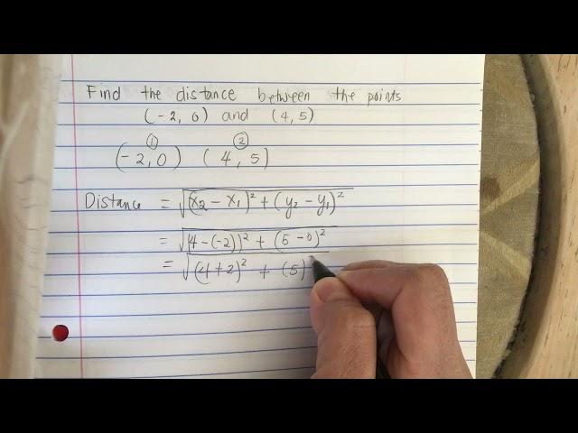 Find the distance between the points (-2,0) and (4,5)