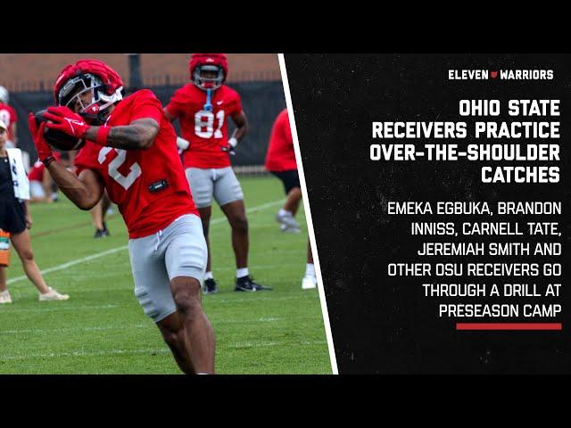 Ohio State receivers practice over-the-shoulder catches during preseason camp drill