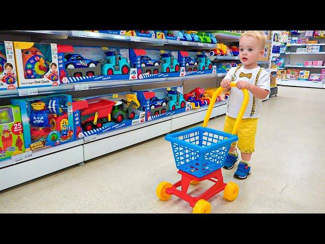 Chris and mom doing shopping in Toy store