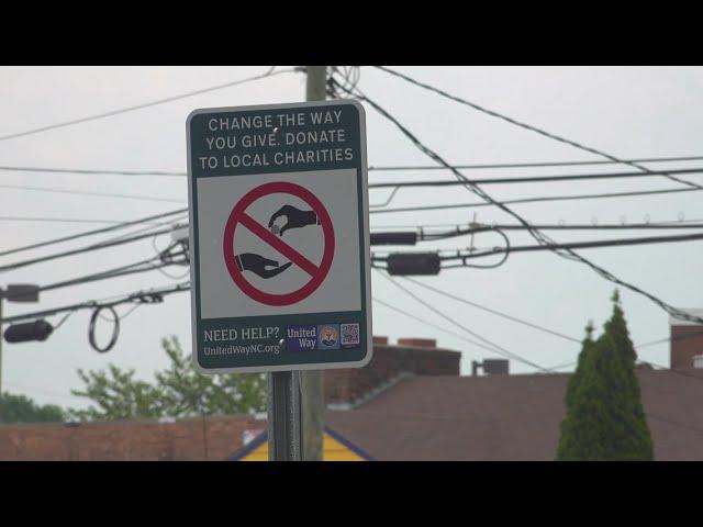 Greensboro leaders put up new signs to discourage panhandling