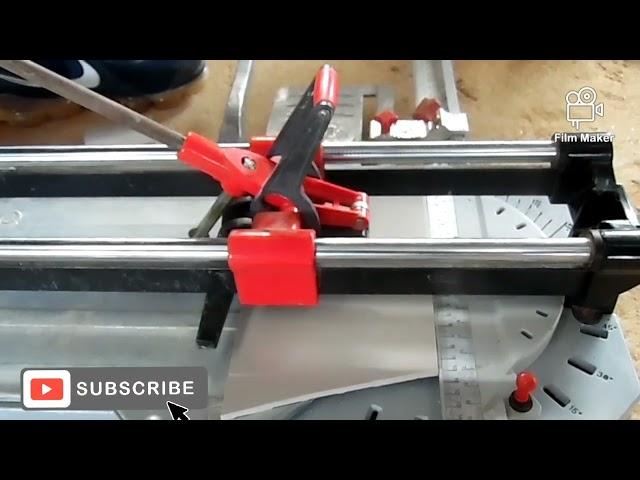 Mr paccy on setting and operating the rubbi machine in tile cutting in construction work
