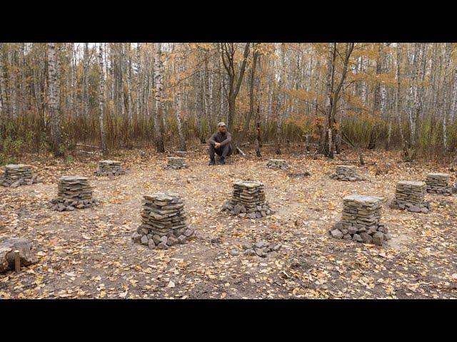 1 month  building a stone foundation for a log cabin by hand