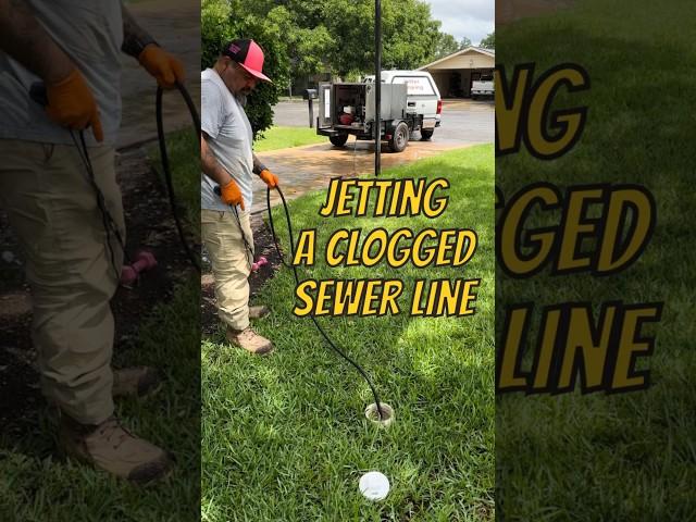 Clearing a clog with a sewer jetter #shorts