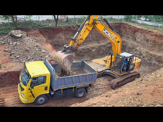 JCB 205 Excavator Dig Big Well Loading Mud in Eicher 2095 Truck and Case 770EX Backhoe Loader