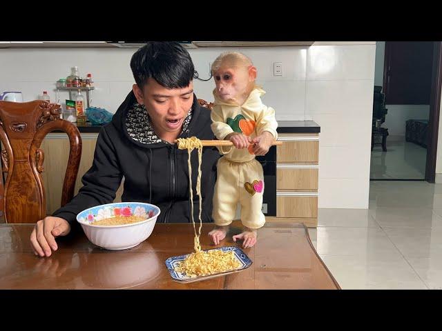 Thang and Luk prepare a simple breakfast together