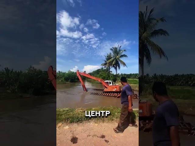 Трактор плавает по воде