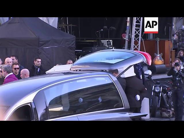 Emmanuel Macron pays tribute to Johnny Hallyday during French icon's funeral