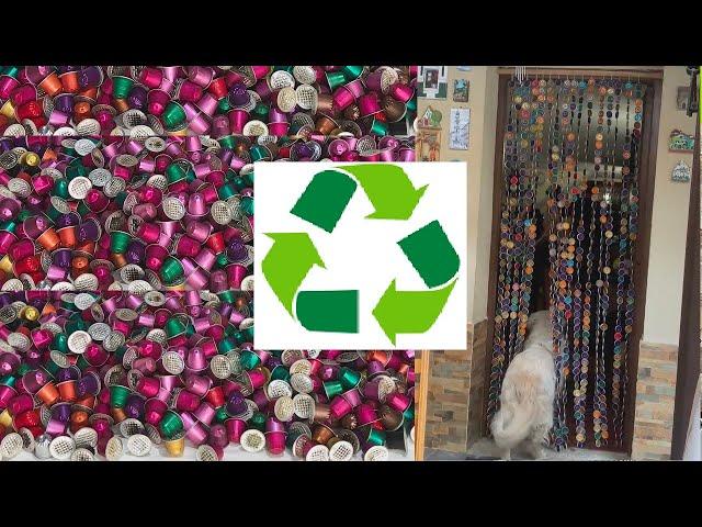 RECYCLE. Decorative curtain with recycled aluminum coffee capsules. Nespresso recycled capsules.