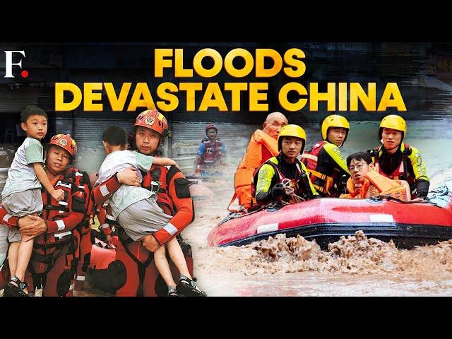 China Floods: Heavy Rains Trigger Landslides; Hundreds Trapped in China's Chongqing