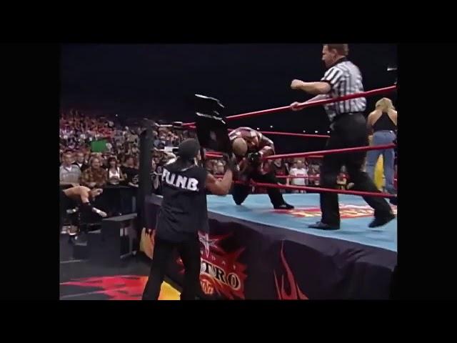 Hogan's brutal chair shot to Konnan. WARNING! GRAPHIC!