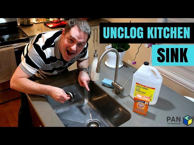 How to unclog a kitchen sink using baking soda and vinegar !!