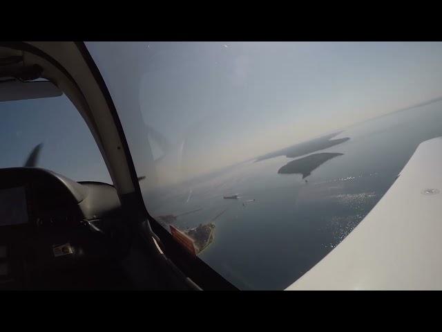 Landing at Mackinac Island KMCD featuring 1000’ freighter