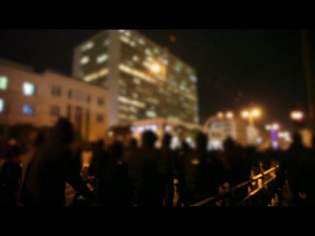 Protest and riot in response to a cop threatening to shoot students inside an Athens University