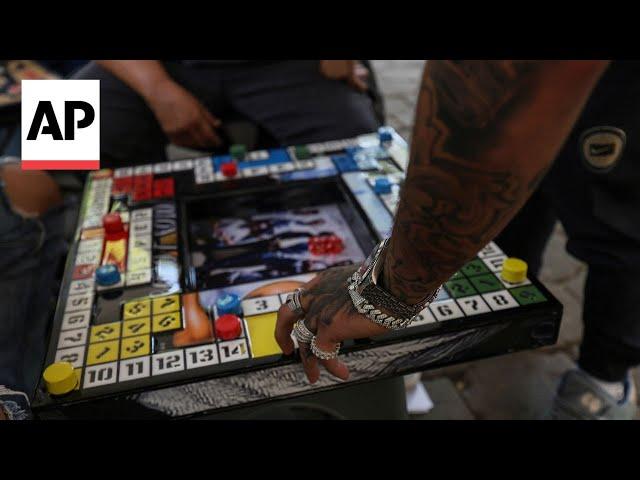 A board game born in Mexican prisons brings together people from all walks of life