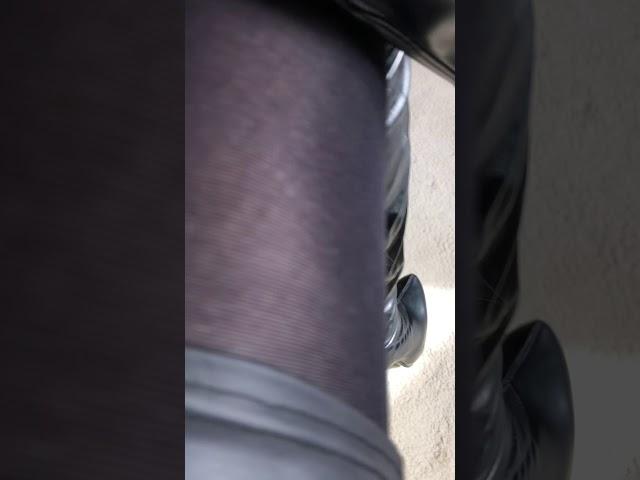 Emma Louise CD Thigh Boots Close up, with Black pantyhose and leather skirt