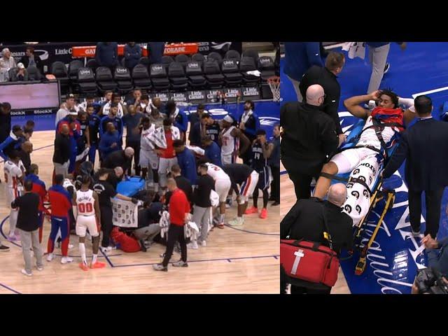 Pistons & Magic surround Jaden Ivey after scary leg injury then gets stretchered off