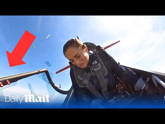 Terrifying moment pilot's canopy shatters mid-flight forcing her to land