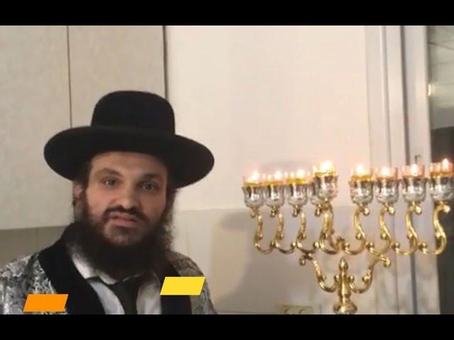 Rabbi Efraim Kachlon blesses the donors to the Be'Ezrat HaShem organizations, on "Zot Chanukkah"