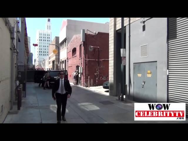 Security guard thinks he's a cop blocking a public road "NO paparazzi"