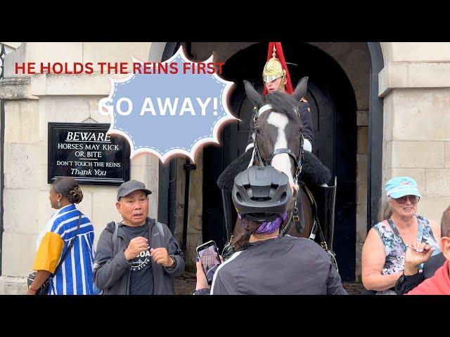 MAN TRIES TO KICK THE KING’S GUARD HORSE