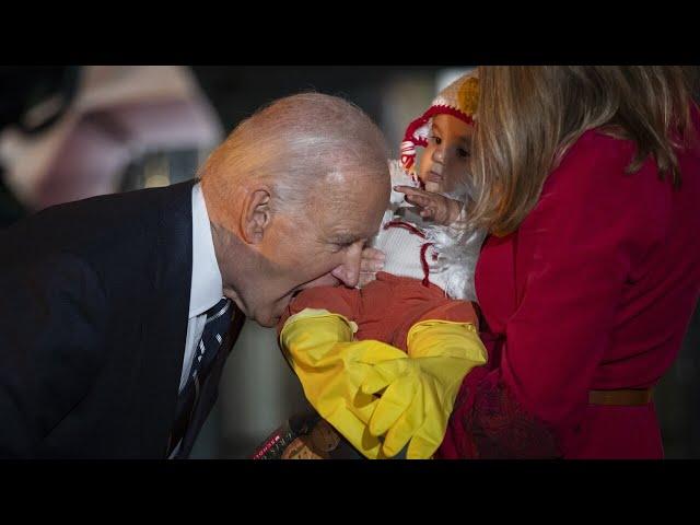 'Odd moment': Joe Biden bites baby during Halloween event