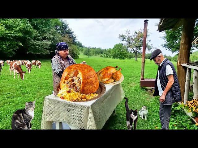 Grandma Cooked Pilaf with Chicken and Dried Fruits in Nature.