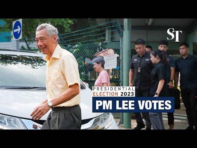 Prime Minister Lee Hsien Loong casts his vote for Singapore’s 9th president