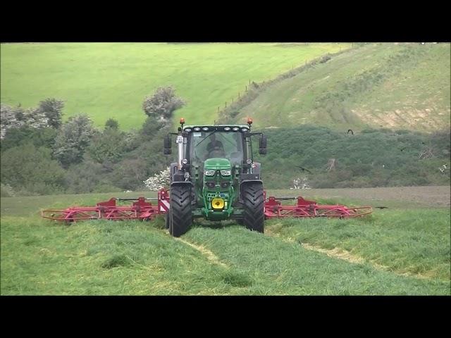 John Deere 6155R tedding