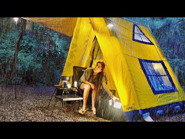 Solo camping in a mess in a leaky inflatable tent in heavy rain