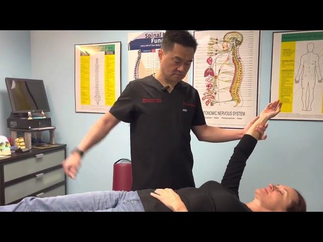 BLACK BELT Chiropactor giving a FULL Body adjustment using Applied Kinesiology Technique.