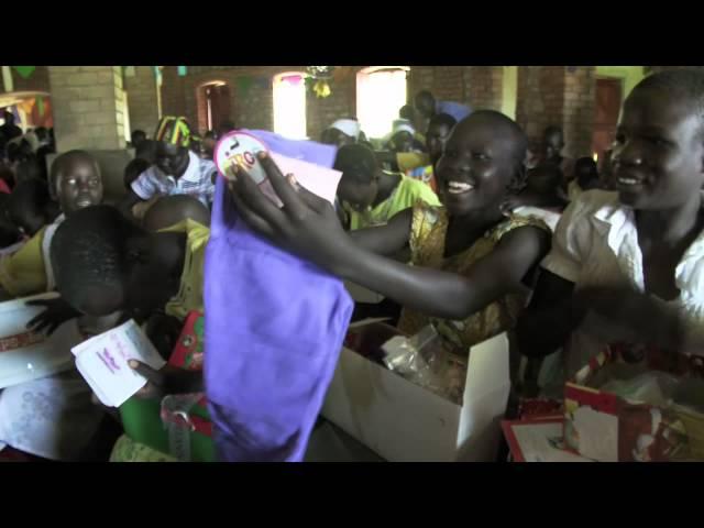 Operation Christmas Child - Sudan Girls Opening Boxes