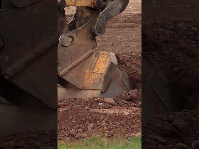 Bucket Attachment Close up scooping dirt and rocks hydraulic excavator #postmymachine