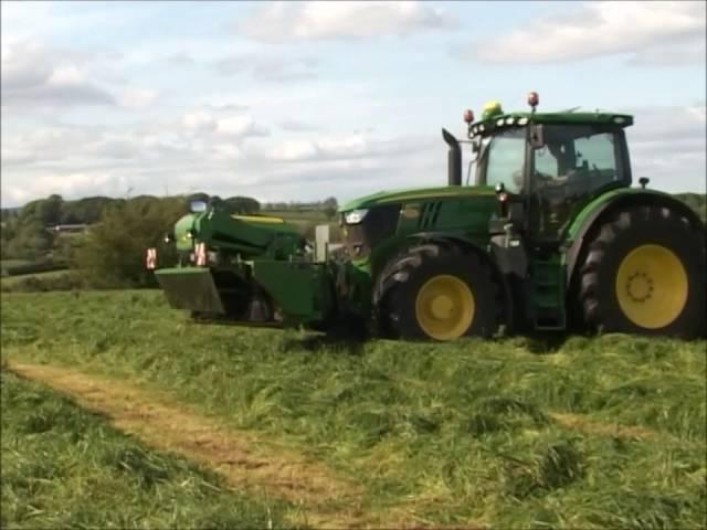 John Deere 6215R with John Deere butterfly mowers