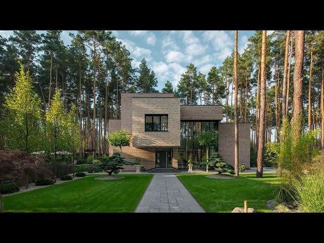 Modern Brick Exterior House Set In A Beautiful Landscape