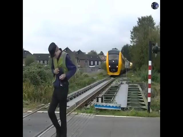 Train crossing incredible big road junction manually