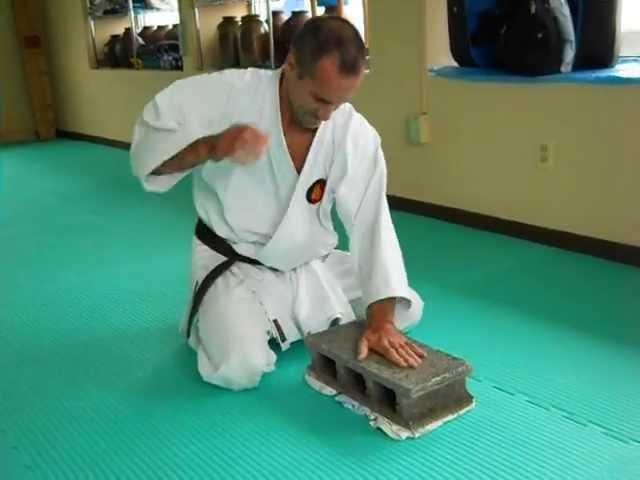 Hands conditioning on concrete block