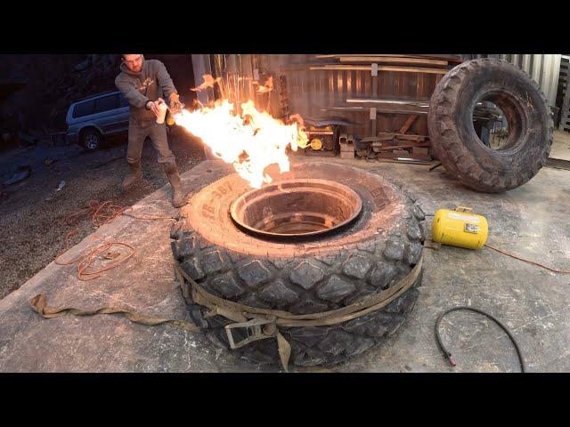 Installing new tires on a roller