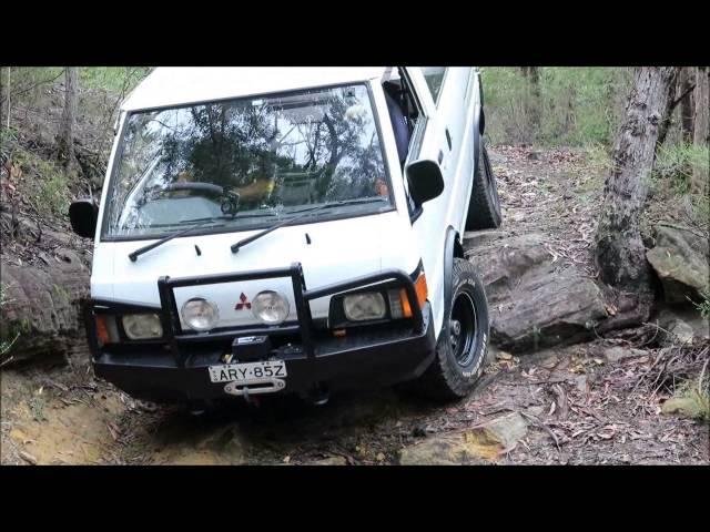 L300 4WD van and Nissan Patrol testing a rocky 4x4 track