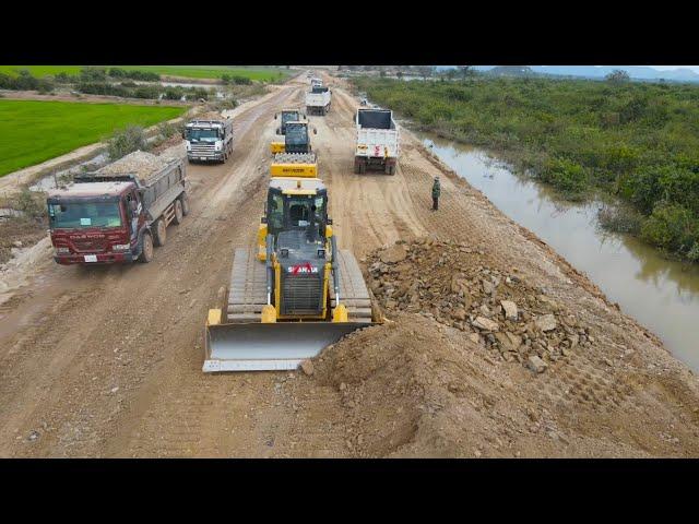 Wonderful beautiful Incredible power bulldozer SHANTUI Clearing building road with many land trucks