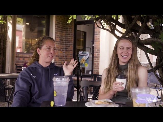 Coaches in a Car Getting Coffee