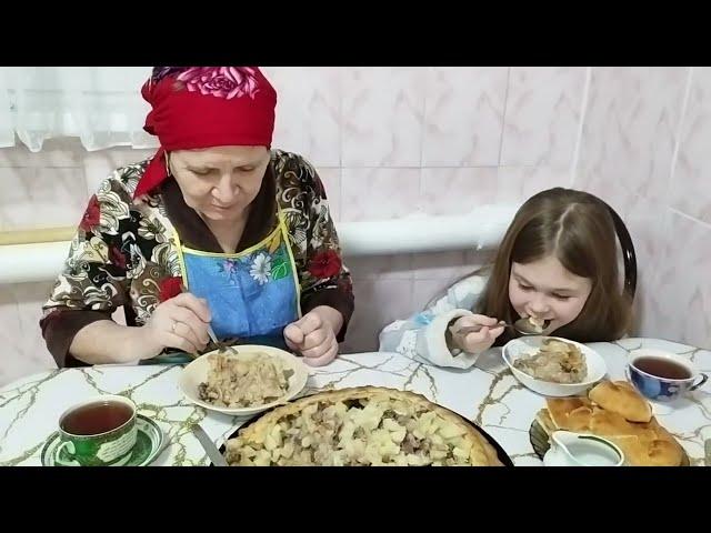 Cooking tatar national dish. Life in a village in Russia in winter.