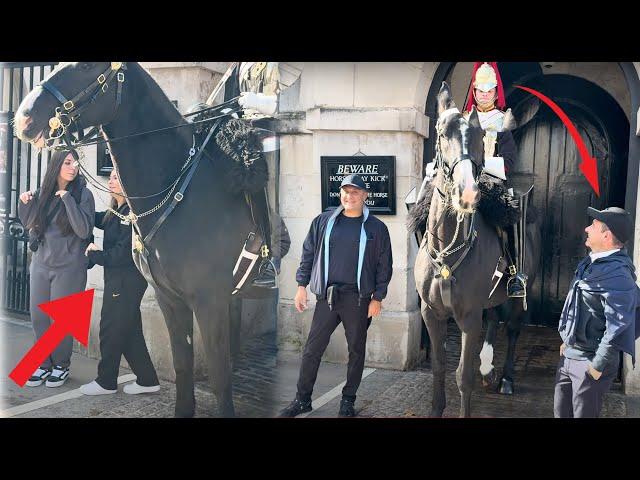 Guard charges his Horse Forward and SHOUT at the Ignorant Tourists get in the box.