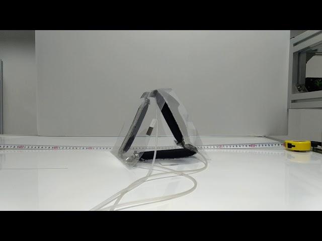 A triangular soft robot for rolling locomotion