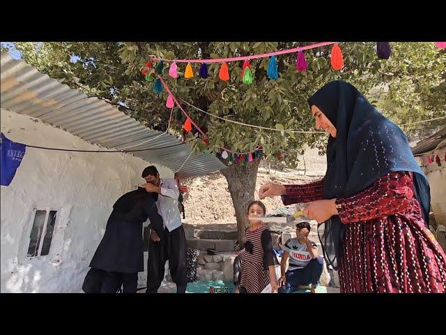 Zainab's return from school: cementing the wall of the hut🫂