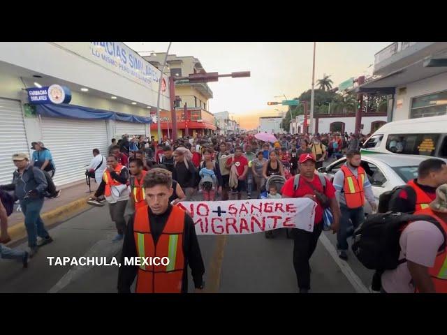 Hundreds of migrants start long walk to Mexico's border with US