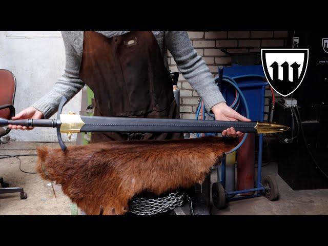 Forging a pattern welded long sword, the complete movie.