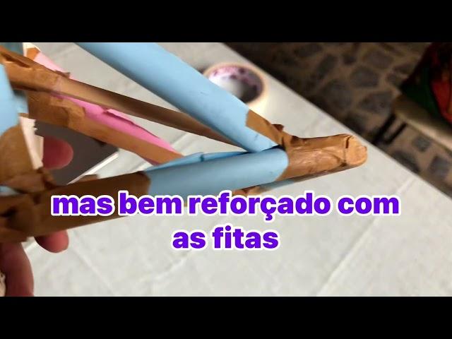 Como fazer uma catapulta de papel, fita, liga elástica, palito de madeira