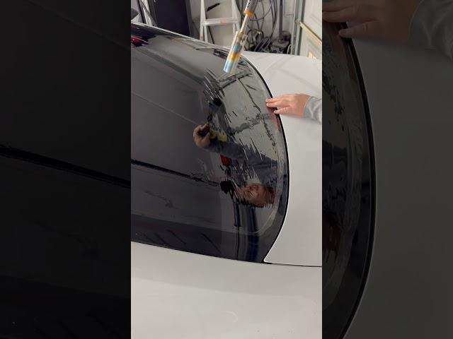 Removing bubbly back window tint and retinting with 5%! Heat shrinking this back window with a torch