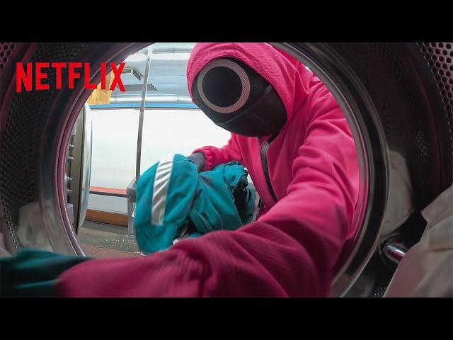 Squid Game Pink Guards Spotted At A Local Laundromat | Netflix